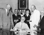 Franklin Roosevelt signs the Social Security act of 1935