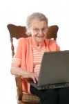 Elderly Woman With A Laptop